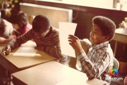 two children reading in class