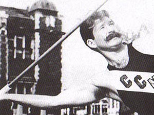 black and white image of a man throwing a javelin