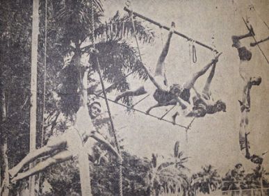 Young Sara Ashworth performing an adagio act and double trapeze