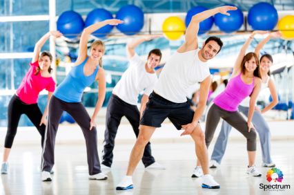 men and women exercising