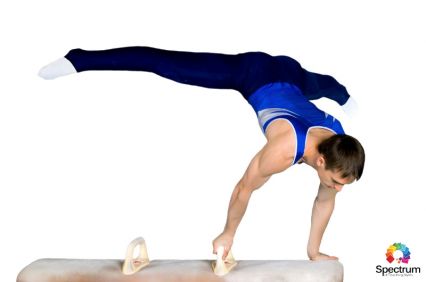male gymnast on pommel horse