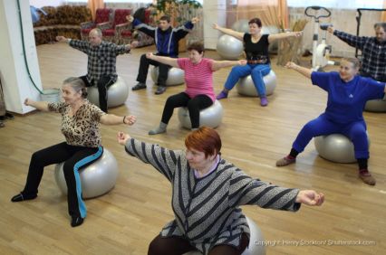group class using yoga balls