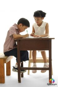 2 children writing